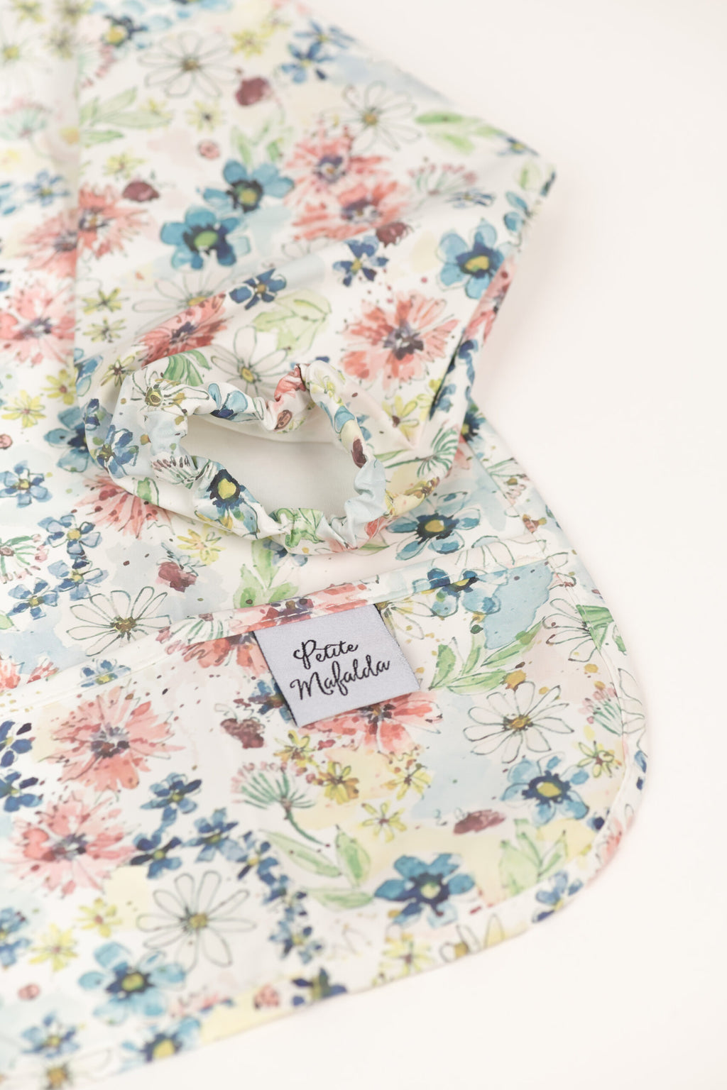 Babero impermeable con mangas