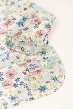 Babero impermeable con mangas