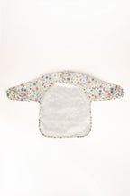 Babero impermeable con mangas