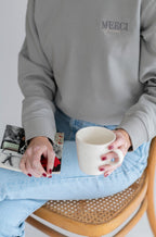 Sudadera merci studio